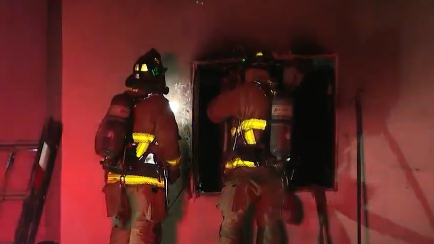 A San Diego firefighter was burned battling a two-alarm house fire in the Oak Park area late Wednesday.