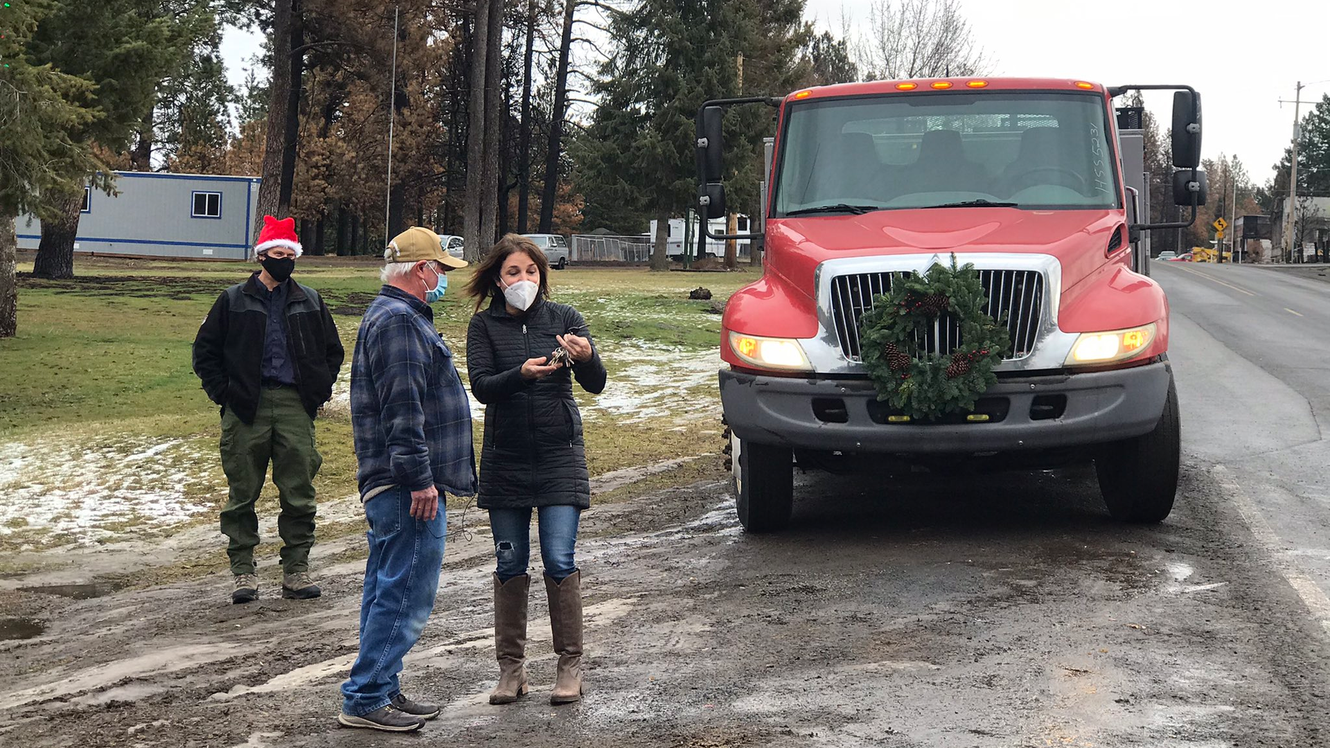 Washington State Commissioner of Public Lands Hilary Franz hands over the keys to a new apparatus she brought as a gift to Malden, WA, firefighters on Thursday, Dec. 17, 2020.