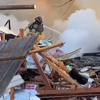 Omaha, NE, firefighters responded to a massive house explosion that leveled a house Tuesday, killing at least one person and critically injuring two others.
