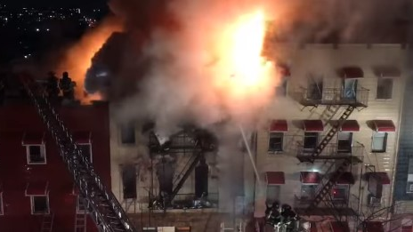 Roughly 200 FDNY firefighters battled a multi-alarm fire that tore through a three-story apartment building in Brooklyn's Williamsburg neighborhood Thursday.
