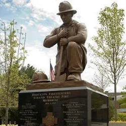 A monument stands in Brockton, MA, to remember the 13 firefighters who died in the Strand Theatre fire on March 10, 1941. A monument stands in Brockton, MA, to remember the 13 firefighters who died in the Strand Theatre fire on March 10, 1941.