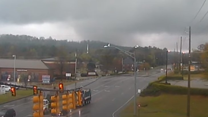A traffic camera captures a tornado touching down in Birmingham, AL, on Thursday.