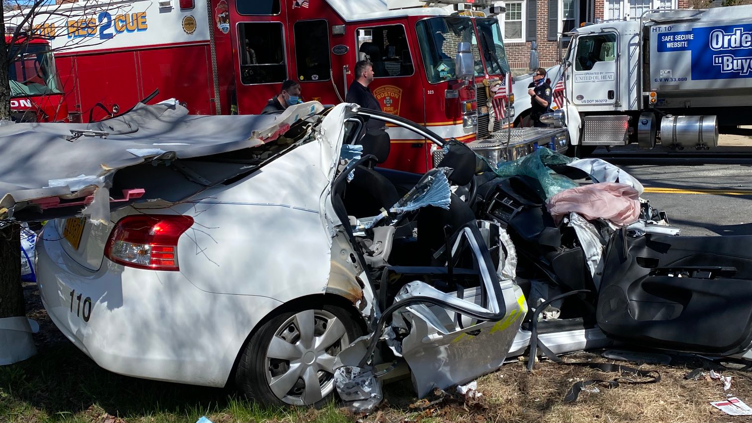 Boston firefighters extricated three people from a serious car accident in the city's Dorchester neighborhood Thursday.