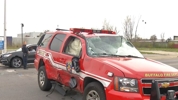 A Buffalo, NY, Fire Department officer was injured after another vehicle T-boned the official's SUV on the way to a call Saturday.
