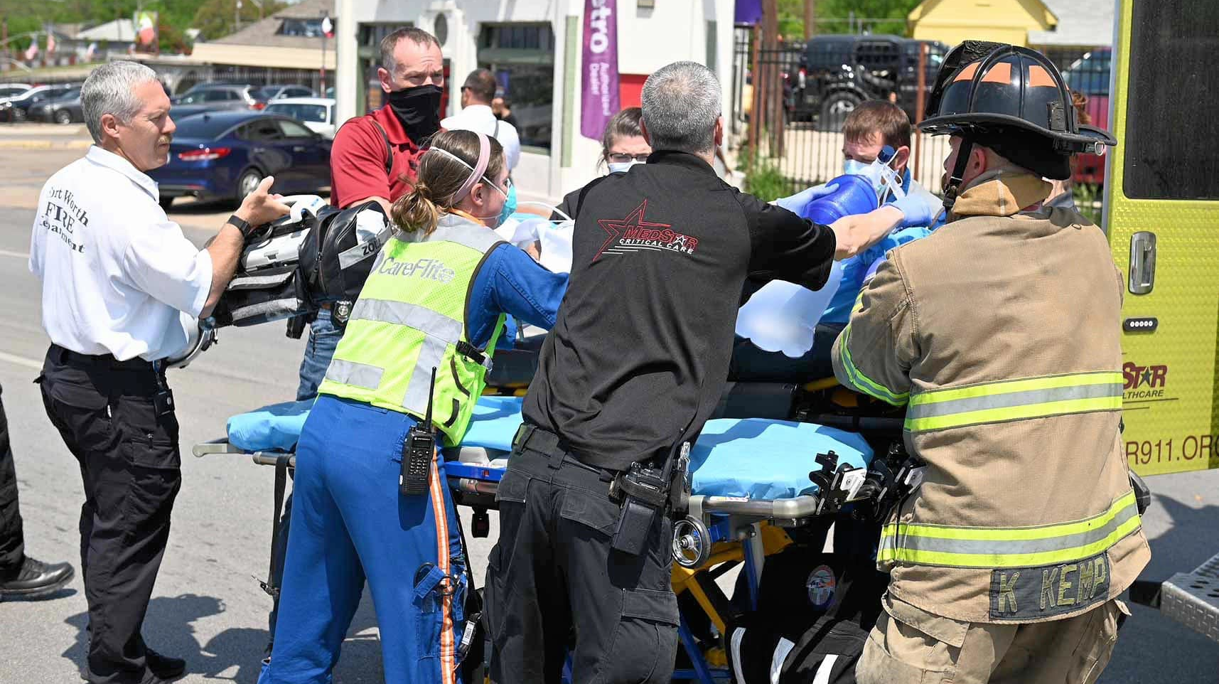 A Fort Worth, TX, firefighter and a woman were seriously injured during a rescue from a detached garage fire Tuesday.