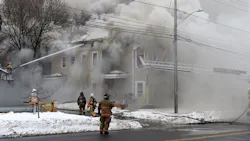 Syracuse, NY, firefighters battle a house fire on Feb. 19. Syracuse, NY, firefighters battle a house fire on Feb. 19.