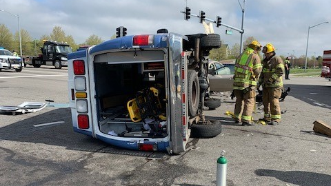 Five people were injured when a privately owned Virginia Beach, VA, ambulance collided with a car Monday, putting the emergency vehicle on its side.