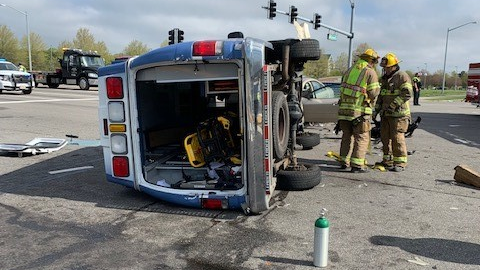 Five people were injured when a privately owned Virginia Beach, VA, ambulance collided with a car Monday, putting the emergency vehicle on its side.