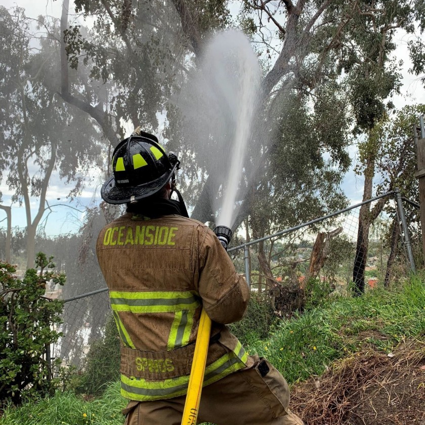 Oceanside, CA, firefighters returning to the station from a call spotted a lightning strike that sparked a vegetation fire Thursday.