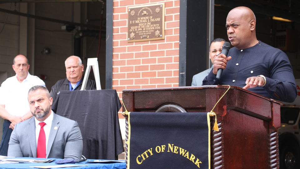 Newark, NJ, Mayor Ras Baraka, right, speaks at a press conference with Public Safety Director Brian O'Hara, left, about a new initiative for firefighters on May 28, 2021.
