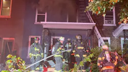 D.C. Fire and EMS firefighters pulled a critically injured woman from the first floor of a burning rowhouse early Wednesday. D.C. Fire and EMS firefighters pulled a critically injured woman from the first floor of a burning rowhouse early Wednesday.