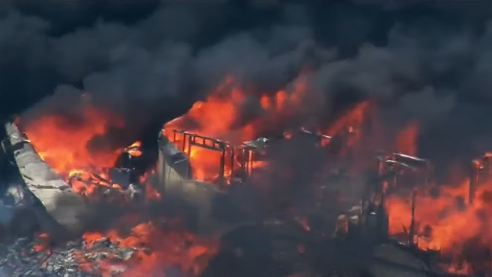 Three teens playing with fire ignited a vegetation fire that caused a massive fireball that engulfed a structure and set off explosions in Martinez, CA, on Wednesday.