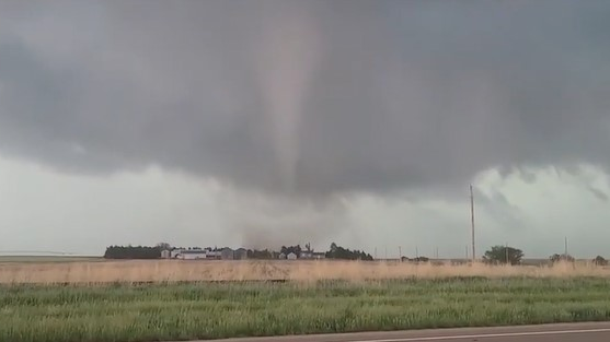 Raw video caught by stormchaser Steven M. King shows a tornado approaching the Selden, KS, on Monday.