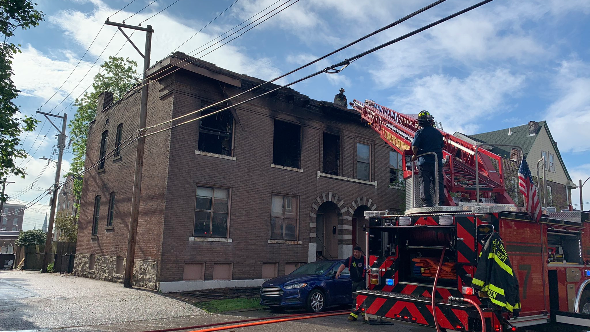One St. Louis firefighter suffered a serious eye injury and another suffered minor burns battling a fire at an apartment building Monday.