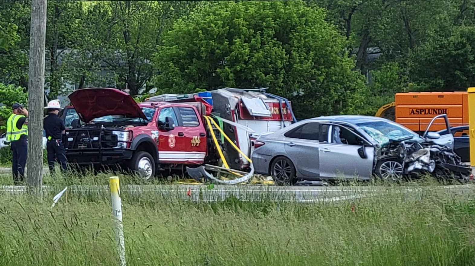 Three West Licking, OH, firefighters and a civilian were injured when a car collided with an apparatus headed to another emergency in Pataskala on Saturday.