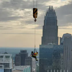 A Charlotte, NC, firefighter rescues a construction worker who was injured on the 40th floor of a skyscraper Thursday. A Charlotte, NC, firefighter rescues a construction worker who was injured on the 40th floor of a skyscraper Thursday.