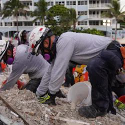 Rescue workers from task forces around the world, including Miami-Dade Fire Rescue and Israel, dig through the rubble of the collapse condo tower in Surfside, FL, on Tuesday. Rescue workers from task forces around the world, including Miami-Dade Fire Rescue and Israel, dig through the rubble of the collapse condo tower in Surfside, FL, on Tuesday.