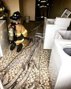 Once the hoseline has been brought into the apartment that’s adjacent to the fire apartment, the working line should be flaked out perpendicular to the hallway door to facilitate easy advancement. Once the hoseline has been brought into the apartment that’s adjacent to the fire apartment, the working line should be flaked out perpendicular to the hallway door to facilitate easy advancement.