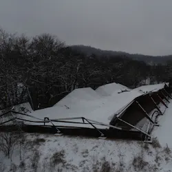 When a large metal barn collapsed, the FFD deployed its drone to monitor structural defects of the structure while firefighters worked inside. When a large metal barn collapsed, the FFD deployed its drone to monitor structural defects of the structure while firefighters worked inside.