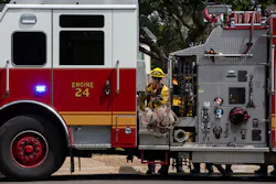 Firefighters practice tactics to manage and steer away fire as they participate in training Tuesday in West Austin. Firefighters practice tactics to manage and steer away fire as they participate in training Tuesday in West Austin.