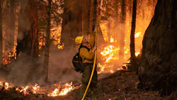 A firefighter works to contain the Caldor Fire on Saturday, Aug. 28, 2021, in Strawberry, CA. A firefighter works to contain the Caldor Fire on Saturday, Aug. 28, 2021, in Strawberry, CA.