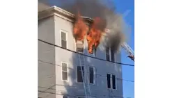 A fire burns on the sixth floor of an apartment building in Lewiston, ME, where a 70-year-old man leaped to escape the flames and died on Sept. 11, 2021. A fire burns on the sixth floor of an apartment building in Lewiston, ME, where a 70-year-old man leaped to escape the flames and died on Sept. 11, 2021.