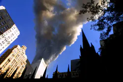 Smoke spews from a tower of the World Trade Center on Sept. 11, 2001, after two hijacked airplanes hit the twin towers in a terrorist attack on New York City. Smoke spews from a tower of the World Trade Center on Sept. 11, 2001, after two hijacked airplanes hit the twin towers in a terrorist attack on New York City.