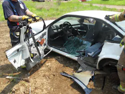 Photo 4: When the third-door-full-removal procedure is employed, if time permits, the entire assembly can be removed by attacking the hinges. Photo 4: When the third-door-full-removal procedure is employed, if time permits, the entire assembly can be removed by attacking the hinges.