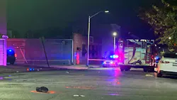 The shoe of a dirtbike rider sits in the foreground after he was struck and killed by a responding Baltimore fire apparatus on Thursday, Oct. 21, 2021. The shoe of a dirtbike rider sits in the foreground after he was struck and killed by a responding Baltimore fire apparatus on Thursday, Oct. 21, 2021.