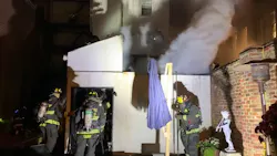 Firefighters work to control a fire adjacent to a DC historical landmark on Nov. 23, 2021. Firefighters work to control a fire adjacent to a DC historical landmark on Nov. 23, 2021.