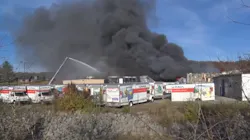 Firefighters use an aerial ladder to control a commercial fire in Beckley, WV, on Wednesday, Nov. 17, 2021. Firefighters use an aerial ladder to control a commercial fire in Beckley, WV, on Wednesday, Nov. 17, 2021.