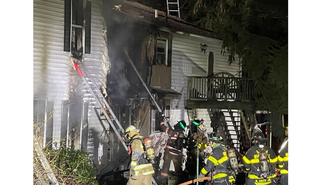 Firefighters operating at a dwelling fire in Fogelsville.