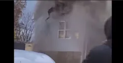 Heavy smoke and fire force a woman to jump from a second story window on Nov. 26, 2021 Heavy smoke and fire force a woman to jump from a second story window on Nov. 26, 2021