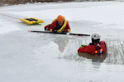 A rescue using a reach pole and a rapid transit sled. A rescue using a reach pole and a rapid transit sled.