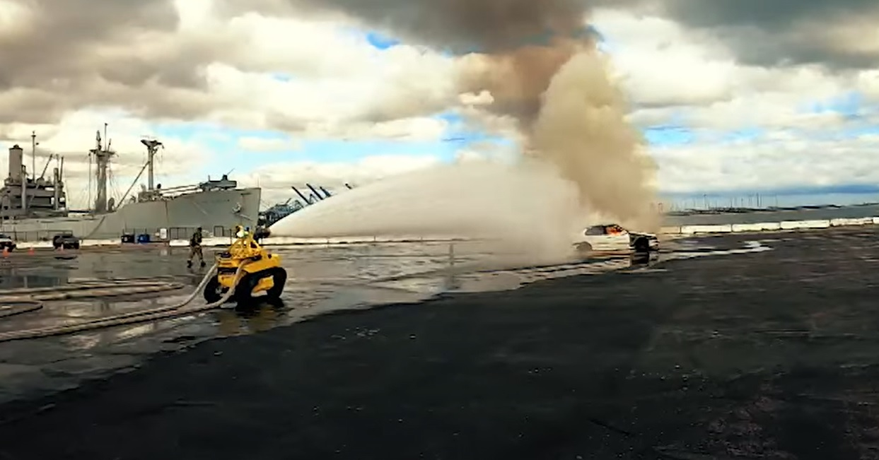The RS3 robot extinguishing a vehicle fire.