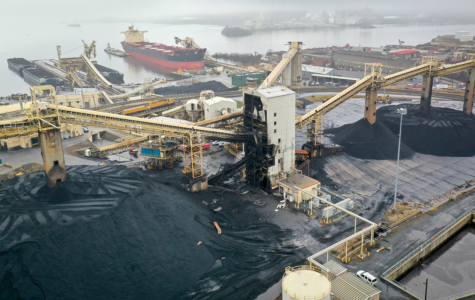 Heavy damage is seen on the coal transfer tower and north tunnel of the CSX Curtis Bay Pier in Baltimore.