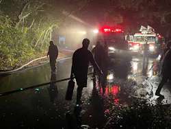 Neighbors pitched in to help firefighters on the remote island where lighting was limited, slowing access. Neighbors pitched in to help firefighters on the remote island where lighting was limited, slowing access.