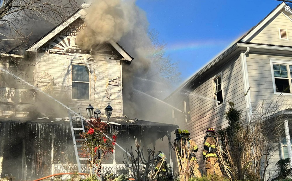 Chattanooga firefighters work to control a fire that damaged multiple dwellings.