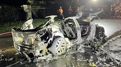 After initial knockdown, the remains of a burnt Tesla Model S received copious amounts of water for almost two hours. Note some of the more than 7,000 rechargeable battery cells on the street in the runoff from this fire. After initial knockdown, the remains of a burnt Tesla Model S received copious amounts of water for almost two hours. Note some of the more than 7,000 rechargeable battery cells on the street in the runoff from this fire.