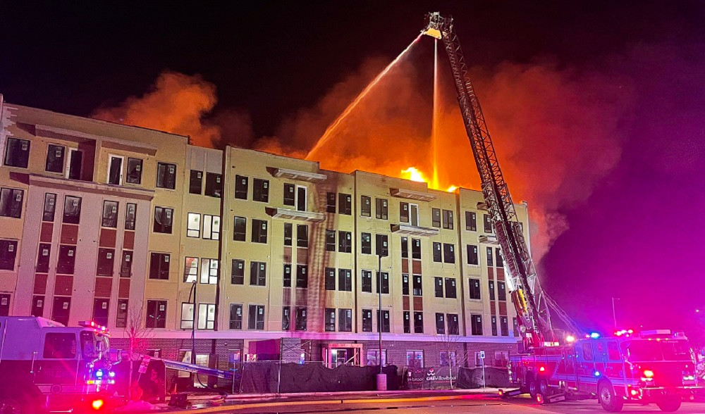 Oklahoma City firefighters battle a massive fire in a 5-story apartment complex under construction.