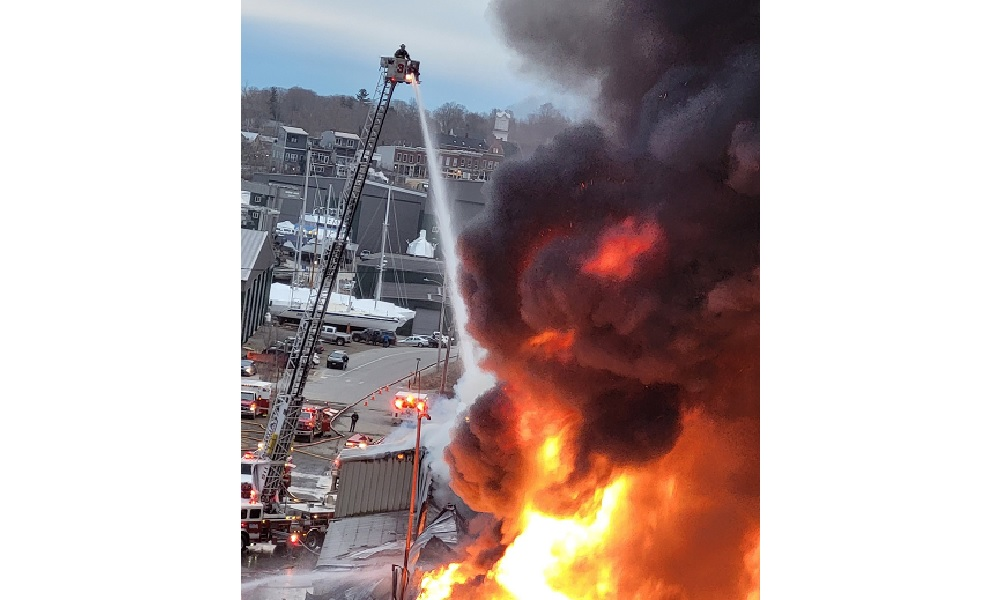 Firefighters work to control a massive blaze in a Belfast potato processing plant.