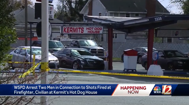 A firefighter and civilian were shot outside a hot dog restaurant in Winston-Salem Friday.