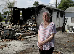 Judith Garwood stands in front of her Hollywood home that went up in flames on April 10. Judith Garwood stands in front of her Hollywood home that went up in flames on April 10.