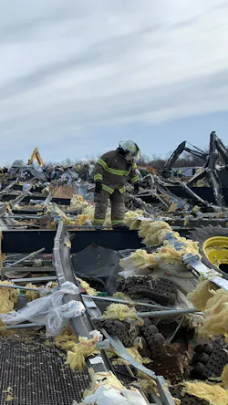 Assistant Chief Chris Travis and Siedel scaled to the top of the factory looking for possible pockets people could’ve been trapped in. Assistant Chief Chris Travis and Siedel scaled to the top of the factory looking for possible pockets people could’ve been trapped in.