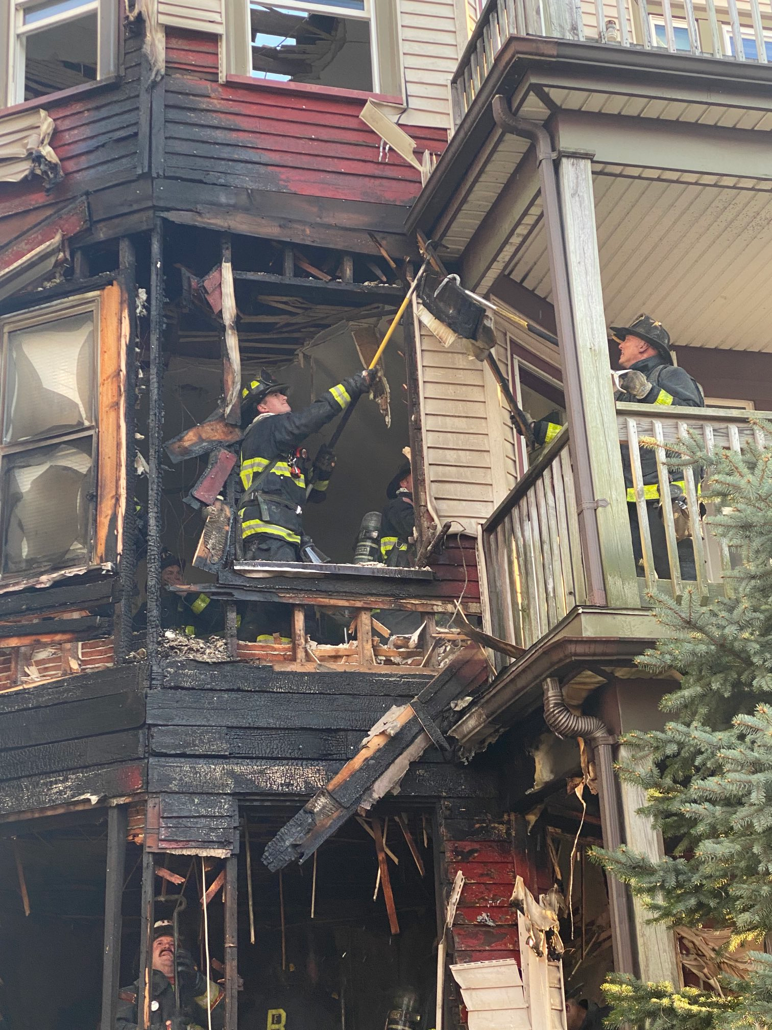 The Boston Fire Department tweeted that three adults and five children were displaced by the fire.