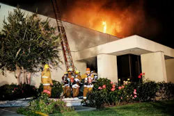 Dozens of Los Angeles firefighters battled a multiple-alarm blaze in a commercial building. Dozens of Los Angeles firefighters battled a multiple-alarm blaze in a commercial building.
