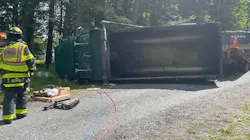 Great Barrington firefighters lifted the truck off the driver and freed him 10 minutes after they arrived. Great Barrington firefighters lifted the truck off the driver and freed him 10 minutes after they arrived.