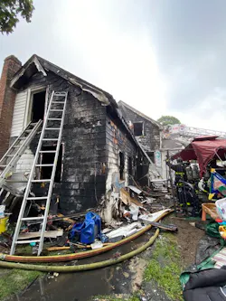An off-duty firefighter, who lived in the building, urged the mom to drop the baby. An off-duty firefighter, who lived in the building, urged the mom to drop the baby.