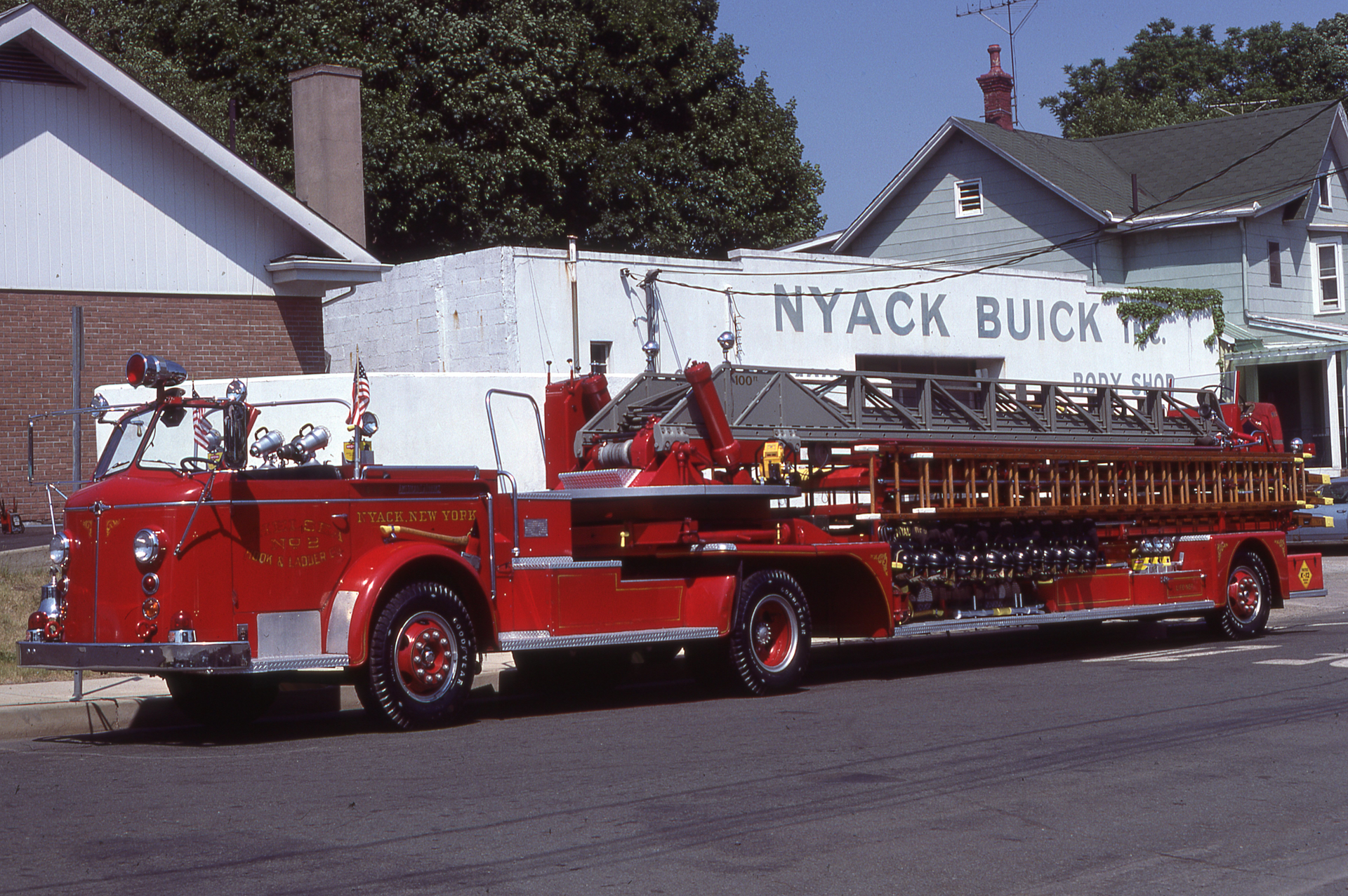 Aerial ladders typically were painted gray, which provided some contrast against the sky and which was claimed to be reasonably easy to maintain and keep clean. The Chelsea Hook and Ladder Company of Nyack, NY, once operated with this 1955 American LaFrance 100-foot tractor-drawn aerial ladder.