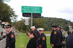 Firefighter Edward L. Nulton Sr. was struck on the opposite side of the road from this sign. Firefighter Edward L. Nulton Sr. was struck on the opposite side of the road from this sign.
